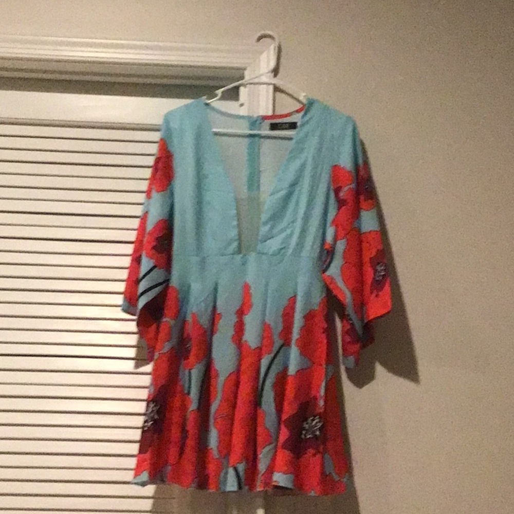 Floral V-Neck Tunic with a peek-a-boo center
